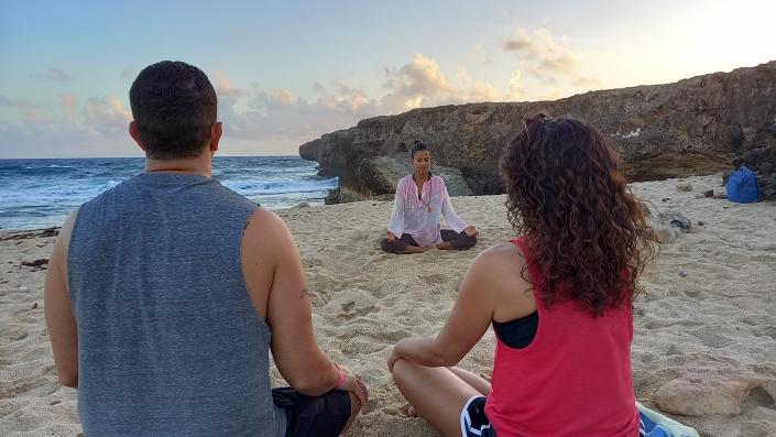 couple private beach meditation aruba